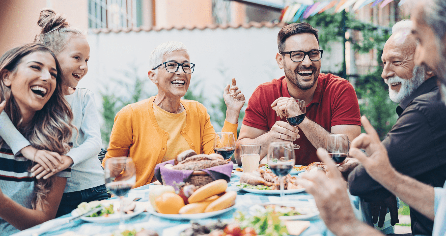 happy family enjoying lunch outdoors