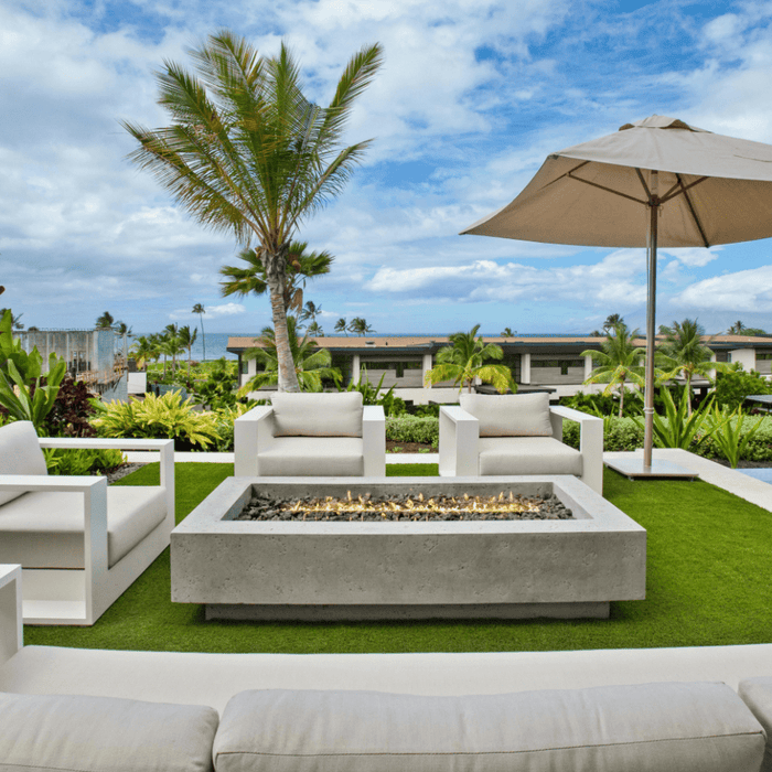 resort like outdoor seating furniture and umbrella