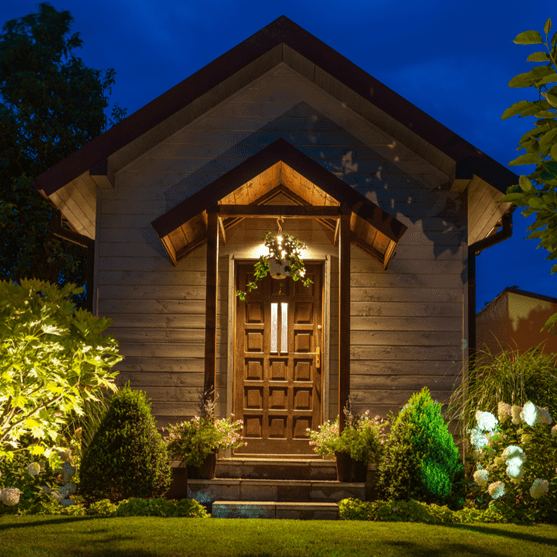 image of a well lit outdoor shed at night