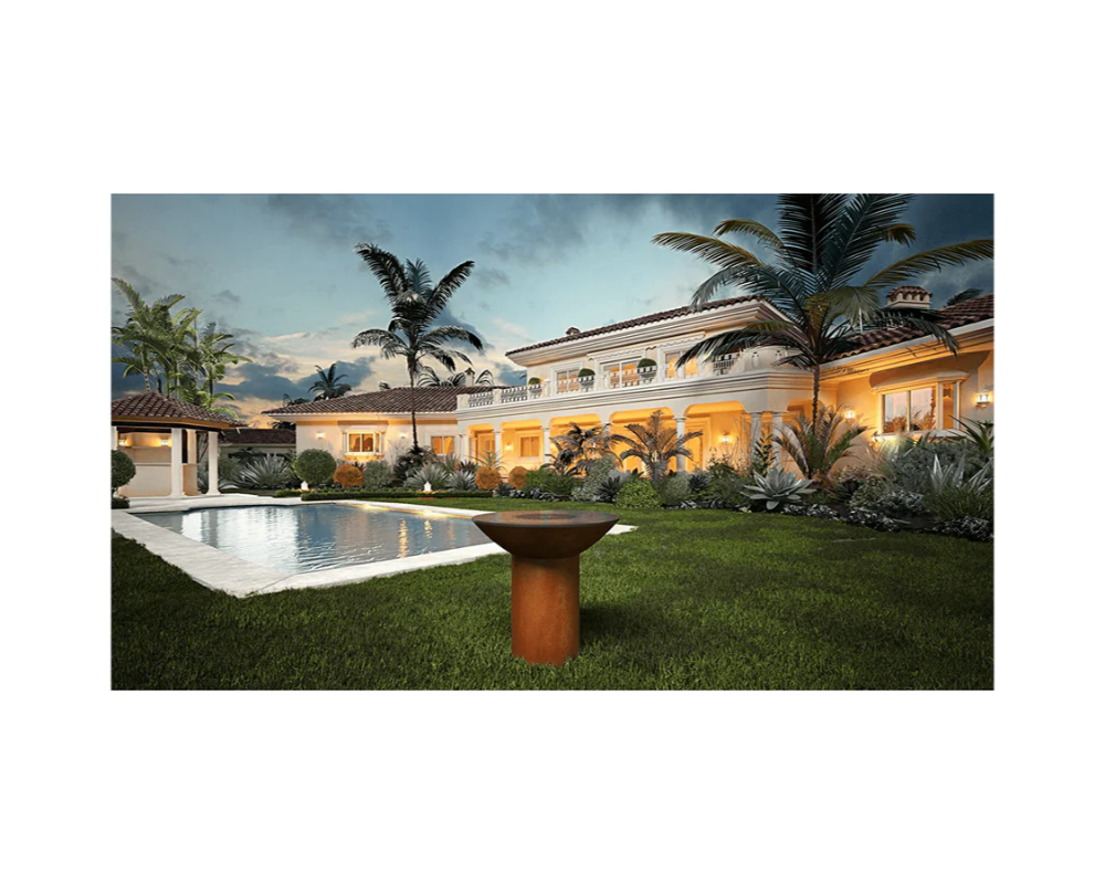 Arteflame Classic 40" Corten Steel Grill with Tall Round Base in luxury estate backyard with pool at sunset
