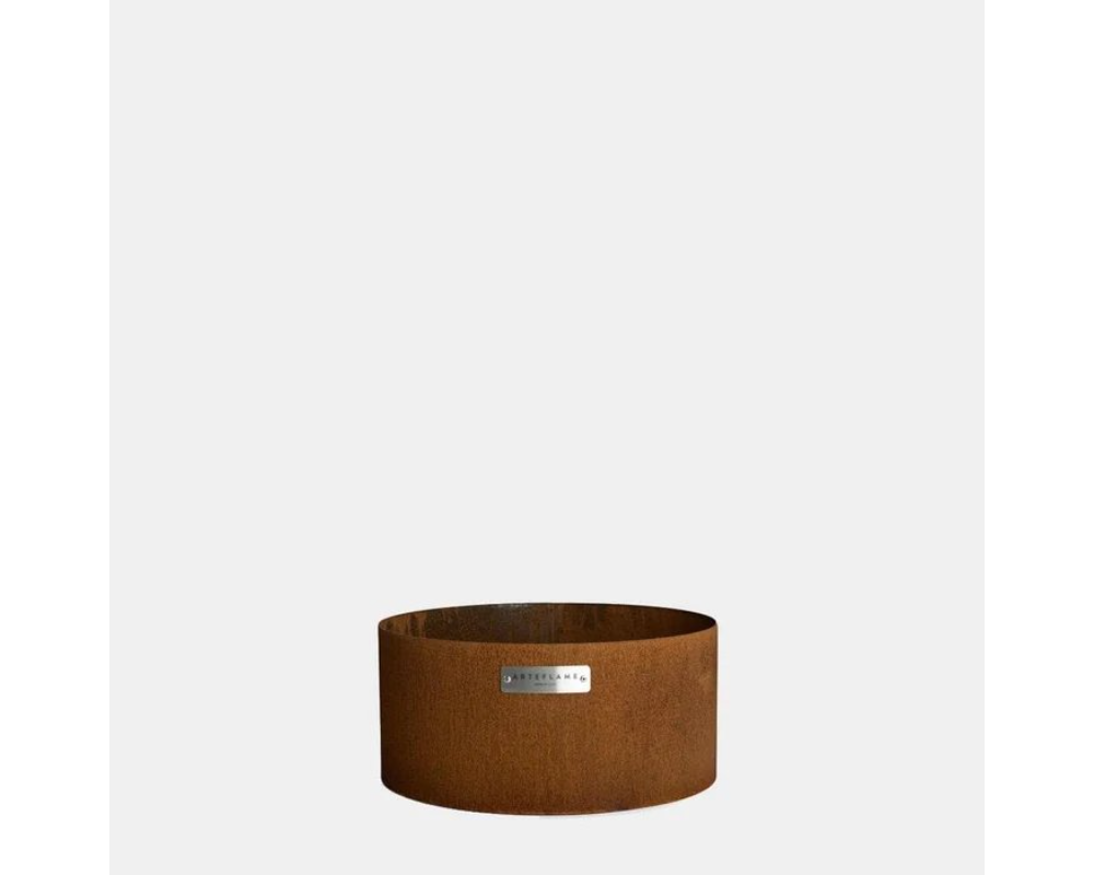 Arteflame Classic Low Round Corten Steel Grill Base stand with weathered rust finish, compact cylinder design front view