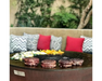 Arteflame One Series 30" Grill flat-top steel surface searing filet mignon steaks and zucchini on outdoor patio