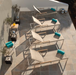 Barlow Tyrie Aura sling chaise lounge champagne frame titanium sling outdoor patio aerial view multiple units arranged
