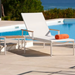 Barlow Tyrie Aura sling chaise lounge arctic white frame pearl sling pool deck outdoor lifestyle side table
