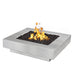 Cabo 48 inch square fire pit in brushed stainless steel with clean architectural edges, flame lit