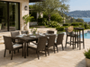 Atlantis dining set and pub set together on a patio overlooking the ocean