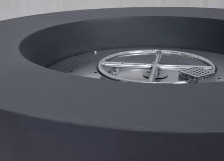 Elementi Lunar Bowl 42" concrete fire pit interior showing stainless steel burner and pan system
