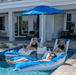 Floating Luxuries Kai Luxury 7.5ft fiberglass pool umbrella Pacific Blue guests relaxing