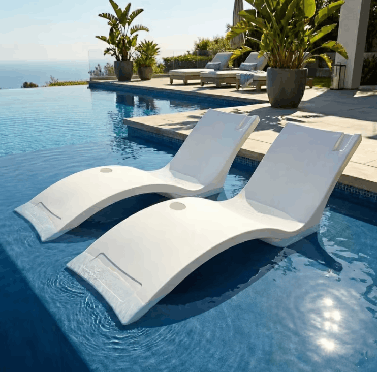 Floating Luxuries Kai pool shelf chaise lounge set of 2 white polymer infinity pool ocean view luxury outdoor resort setting
