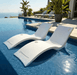Floating Luxuries Kai pool shelf chaise lounge set of 2 white polymer infinity pool ocean view luxury outdoor resort setting