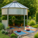 Sioux Steel grain bin gazebo styled as an outdoor yoga and wellness retreat with yoga mats, candles, and lush garden surroundings