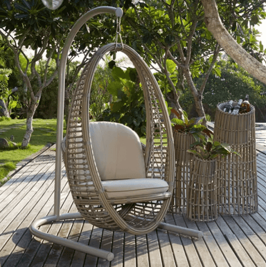 kubu mushroom heri hanging chair at a garden