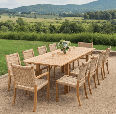 Kingsley Bate Hyannis Hudson 11-piece teak outdoor dining set with woven chairs on gravel patio with mountain view