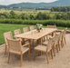 Kingsley Bate Hyannis Hudson 11-piece teak outdoor dining set with woven chairs on gravel patio with mountain view