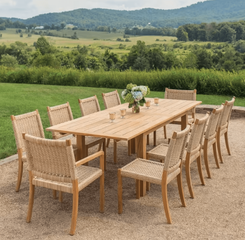 Kingsley Bate Hyannis Hudson 11-piece teak outdoor dining set with woven chairs on gravel patio with mountain view