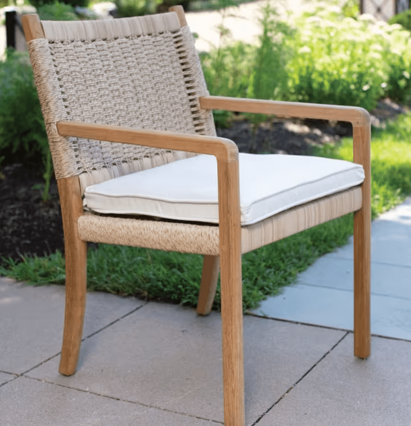 Kingsley Bate Hudson outdoor dining armchair with teak frame, woven rope back, and white seat cushion
