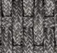 Kingsley Bate Hudson dining chair close-up of charcoal woven rope texture and weave pattern detail
