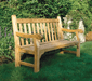 Close-up product shot showing joinery detail, golden teak, garden background
Kingsley Bate Hyde Park solid teak garden bench mortise tenon joinery golden finish garden