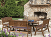 Jensen Outdoor Heritage 5-Piece Outdoor Dining Set in brown poly lumber with backed benches on stone patio