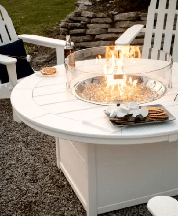 POLYWOOD Classic round fire pit table in white with glass wind guard, outdoor patio
