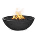 Sedona round concrete fire pit lit at dusk