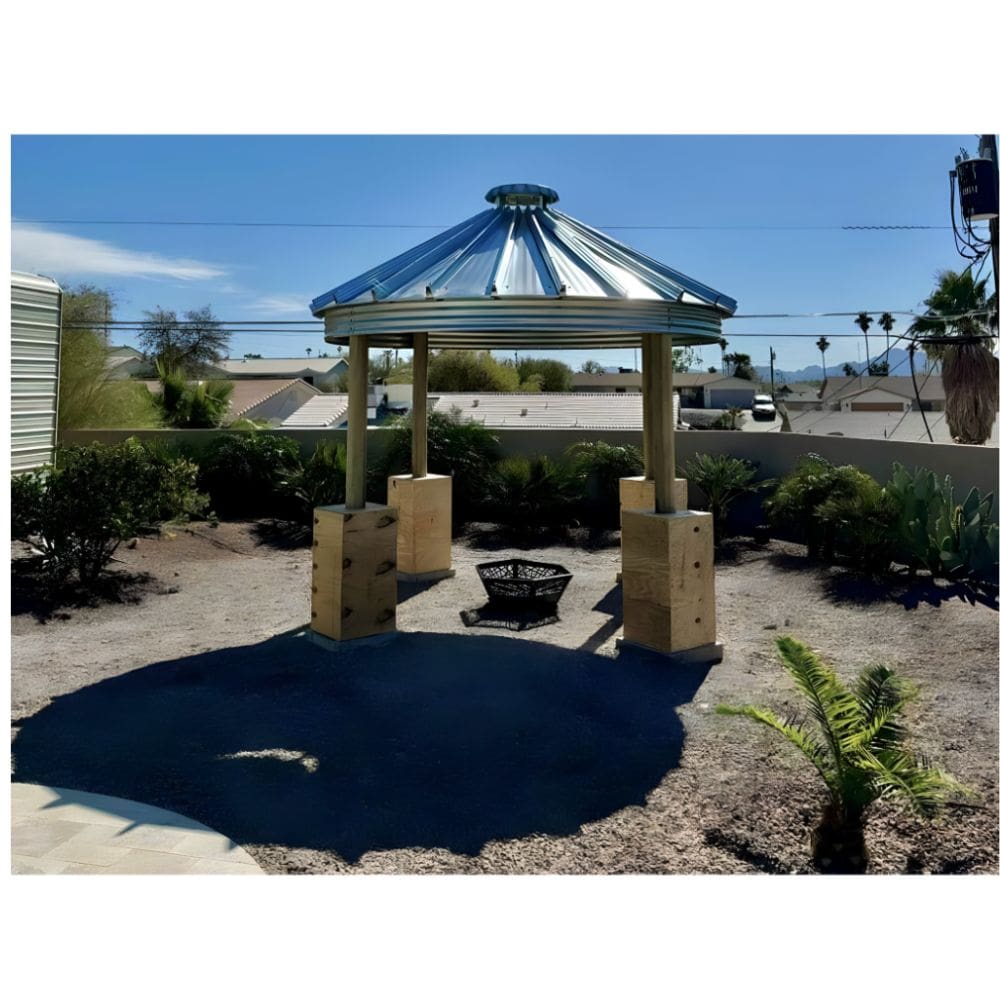 Sioux Steel grain bin gazebo with fire pit in a desert backyard — durable all-season outdoor structure for STR hosts