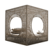 A modern outdoor cube daybed with intricate geometric laser-cut metal screens, featuring two large circular openings with cushions inside, shown on a white background.