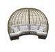 A curved outdoor daybed with a large arched dome-style wicker canopy and thick white cushions, shown on a plain white background.