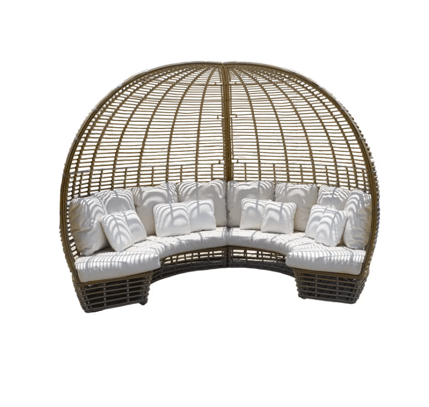 A curved outdoor daybed with a large arched dome-style wicker canopy and thick white cushions, shown on a plain white background.