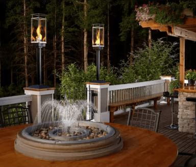 Travis Industries Tempest Torch pair pillar mount outdoor deck patio evening ambiance