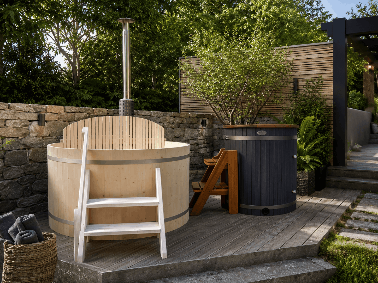 Winter Soak Bundle: Aleko pine wood-fired hot tub with internal stove and chimney beside the Lumina cedar cold plunge tub, on a stone patio with a towel basket and potted tree