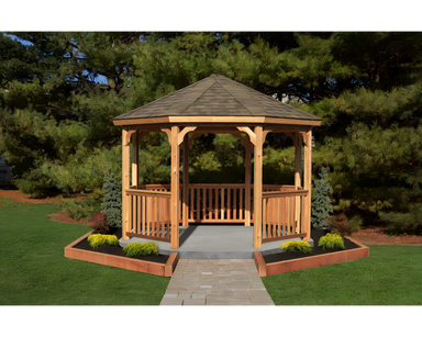 YardCraft 12ft wood octagon gazebo kit in backyard garden setting
