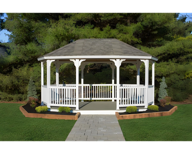 YardCraft 12x18 vinyl oval gazebo kit in backyard garden setting