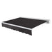 Awntech Destin motorized retractable awning in Black acrylic fabric, extended, three-quarter view with white aluminum hood and wave valance