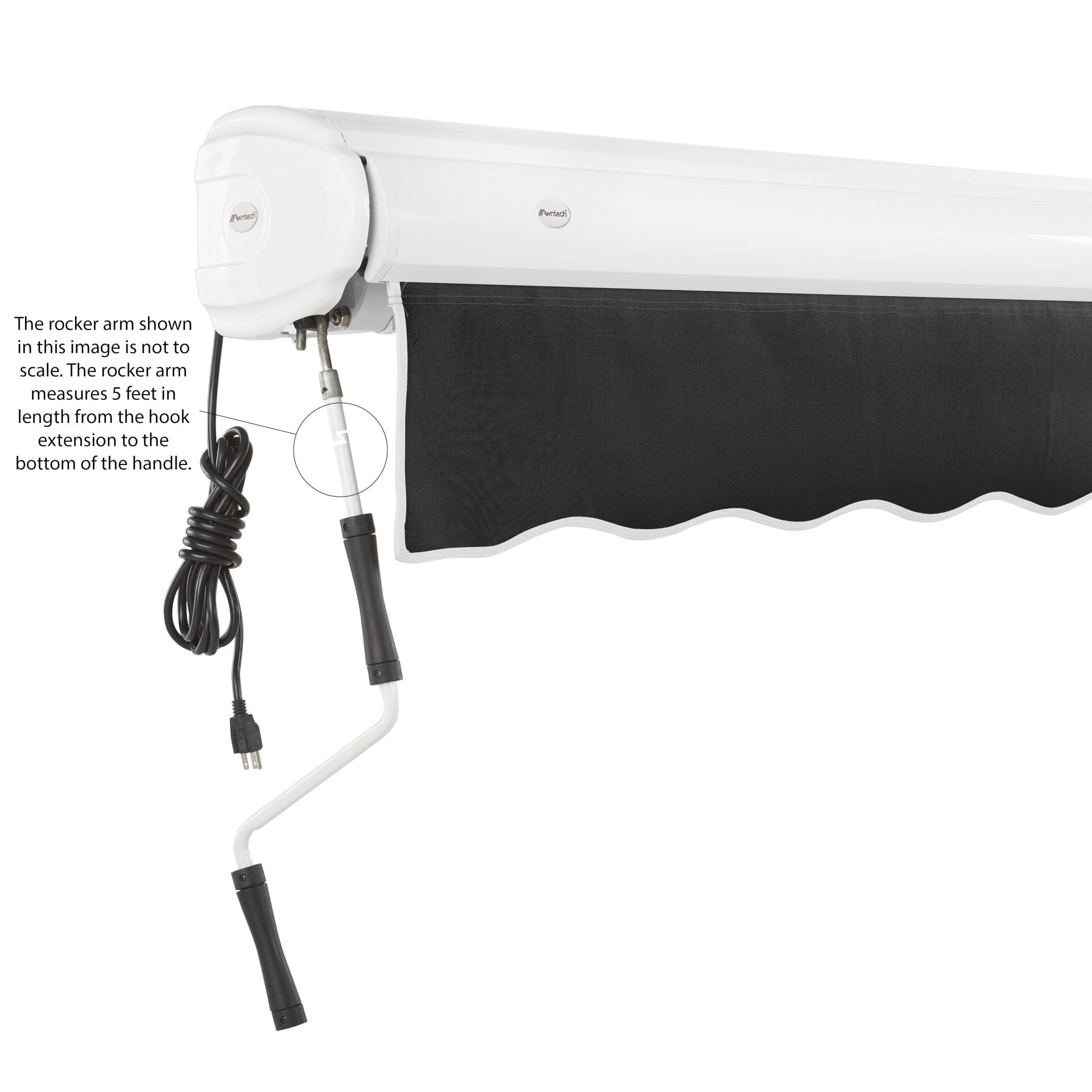 Black Awntech Key West full cassette awning retracted into its closed white cassette, with motor cord and rocker arm