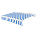 Awntech Key West full cassette motorized retractable awning in Bright Blue/White Stripe acrylic fabric, extended, three-quarter view with white full cassette housing and wave valance