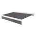 Awntech Key West full cassette motorized retractable awning in Gunmetal acrylic fabric, extended, three-quarter view with white full cassette housing and wave valance