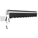Black Awntech Maui motorized awning retracted, showing the exposed fabric roll, left motor, 12 ft power cord and 5 ft rocker arm